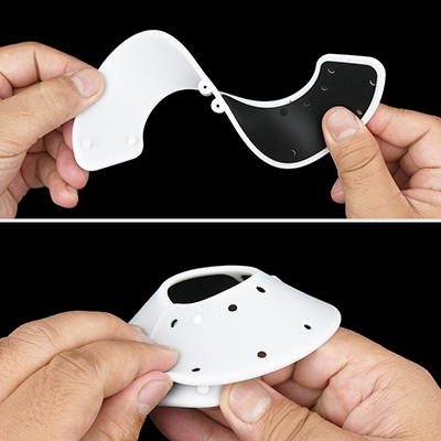 柔軟なシリコンパッドは、黒い電極側が接触面です。ホックは２点留めで、穴に突起を入れて接続する仕様です。