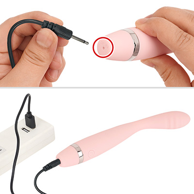 底部の穴に専用プラグを突き挿して充電します。フル充電までは約100分、連続稼働は約60分です。充電中はボタンが点滅します。