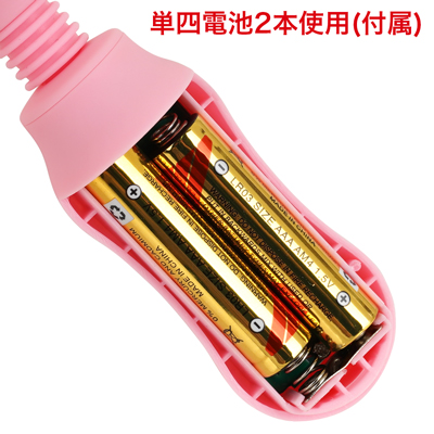 背面の電池蓋を外し、写真の向きに合わせて電池をセットしてください。　※付属の電池は「動作確認用テスト電池」です。