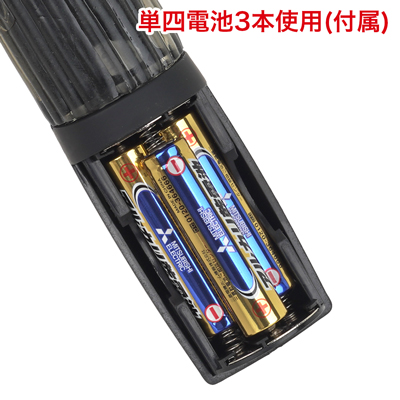 電池交換の際は背面の電池蓋を外し、写真の向きに合わせて電池をセットしてください。　※付属の電池は「動作確認用テスト電池」です。