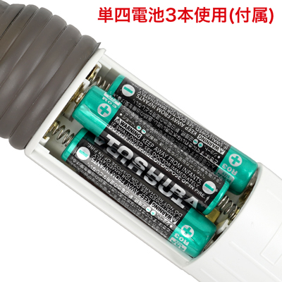 背面の電池蓋を外し、写真の向きに合わせて電池をセットしてください。　※付属の電池は「動作確認用テスト電池」です。